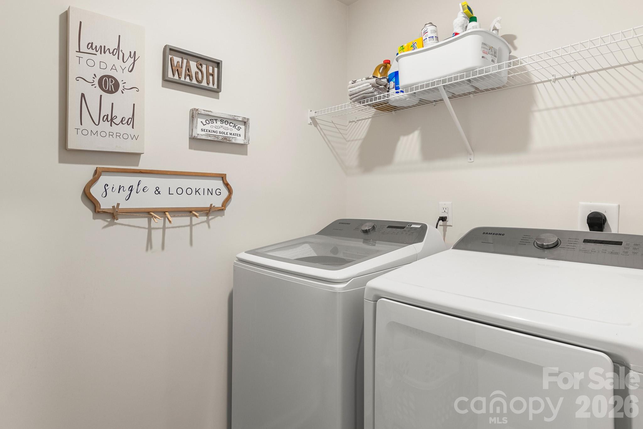 744 Saddlebred Lane Locust, NC 28097 - Photo 30 of 47 a utility room with dryer and washer