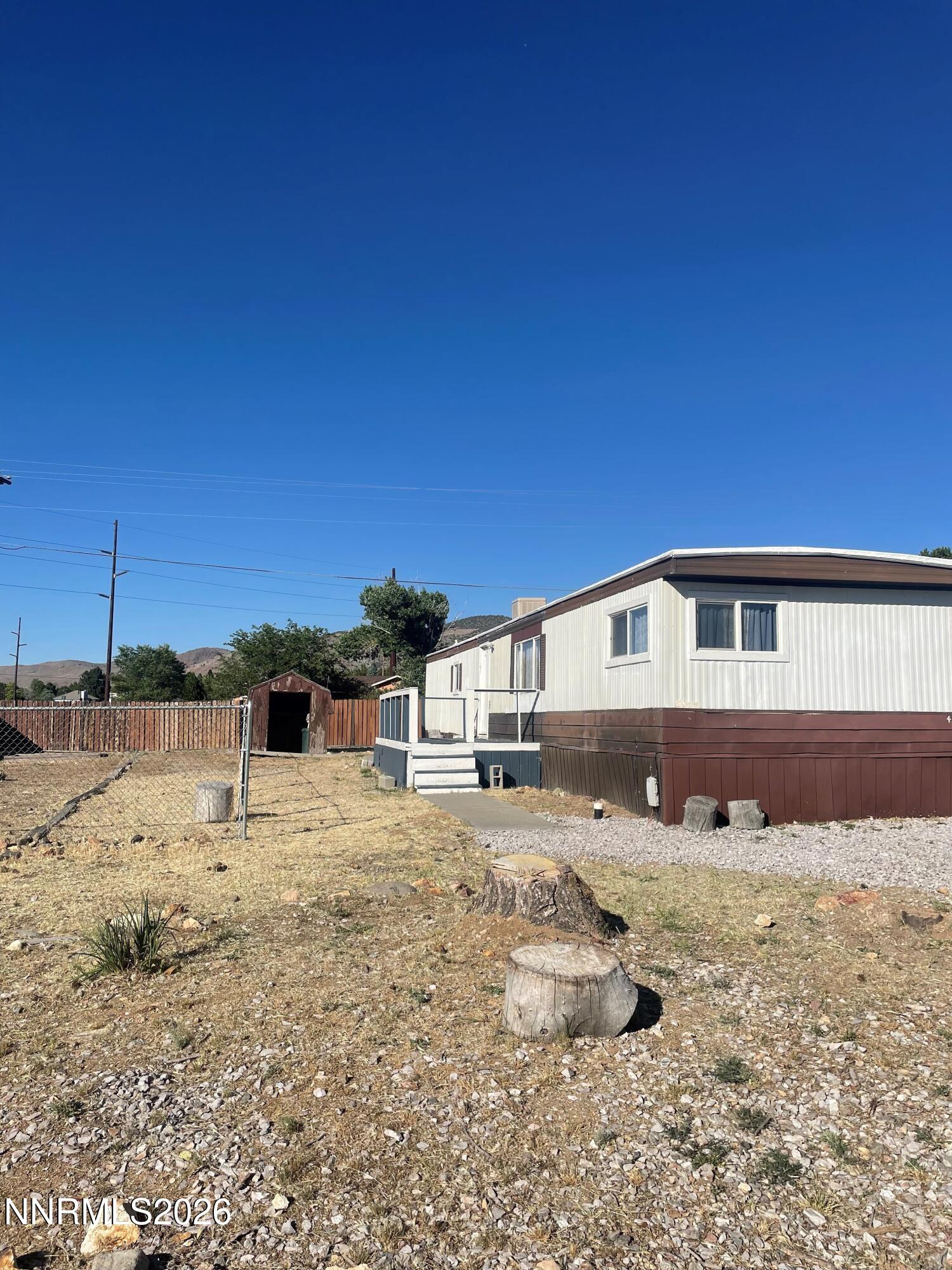 400 Mira Street Reno, NV 89521 - Photo 3 of 11 a front view of a house with a yard