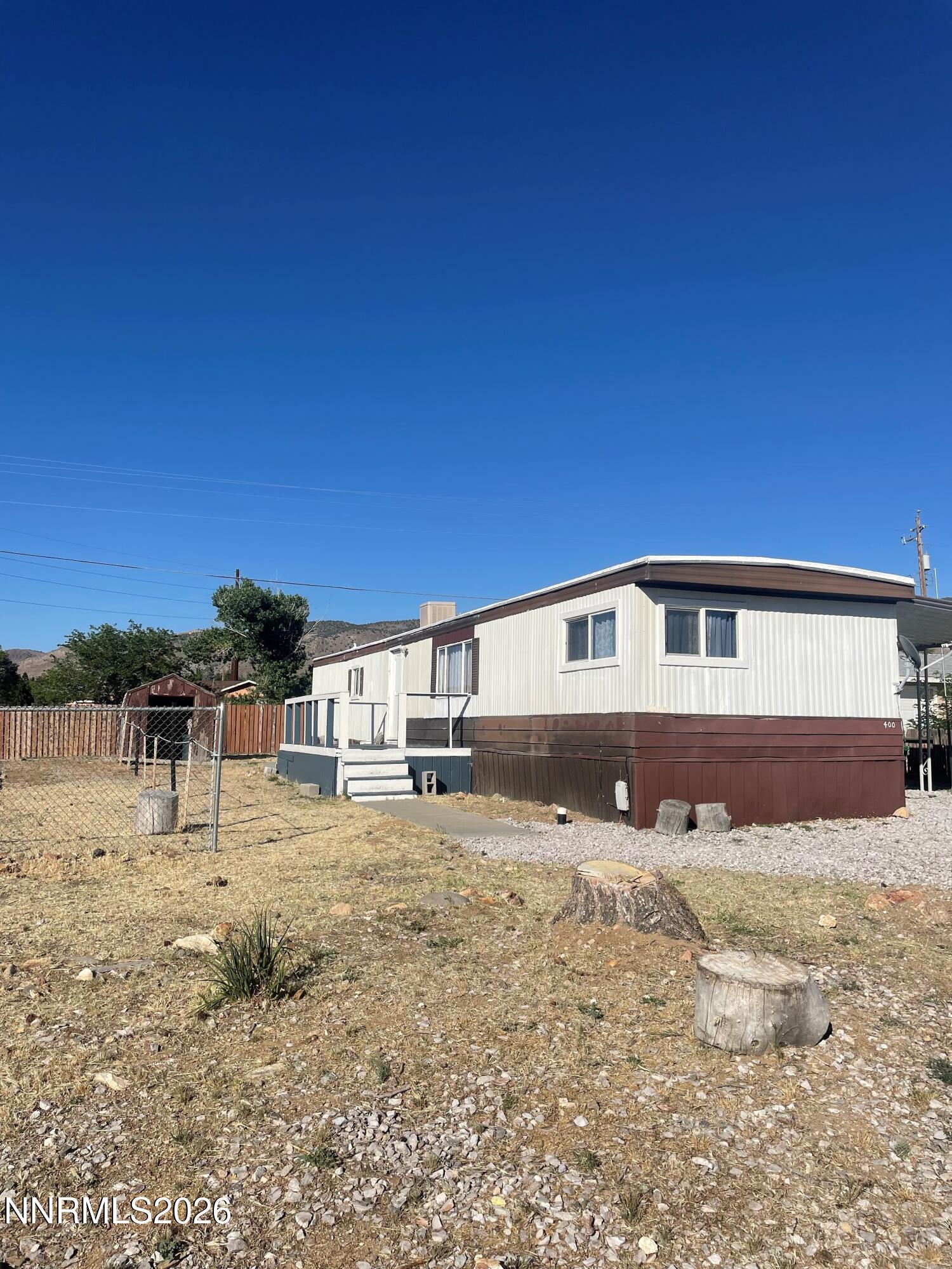400 Mira Street Reno, NV 89521 - Photo 4 of 11 a front view of a house with a yard