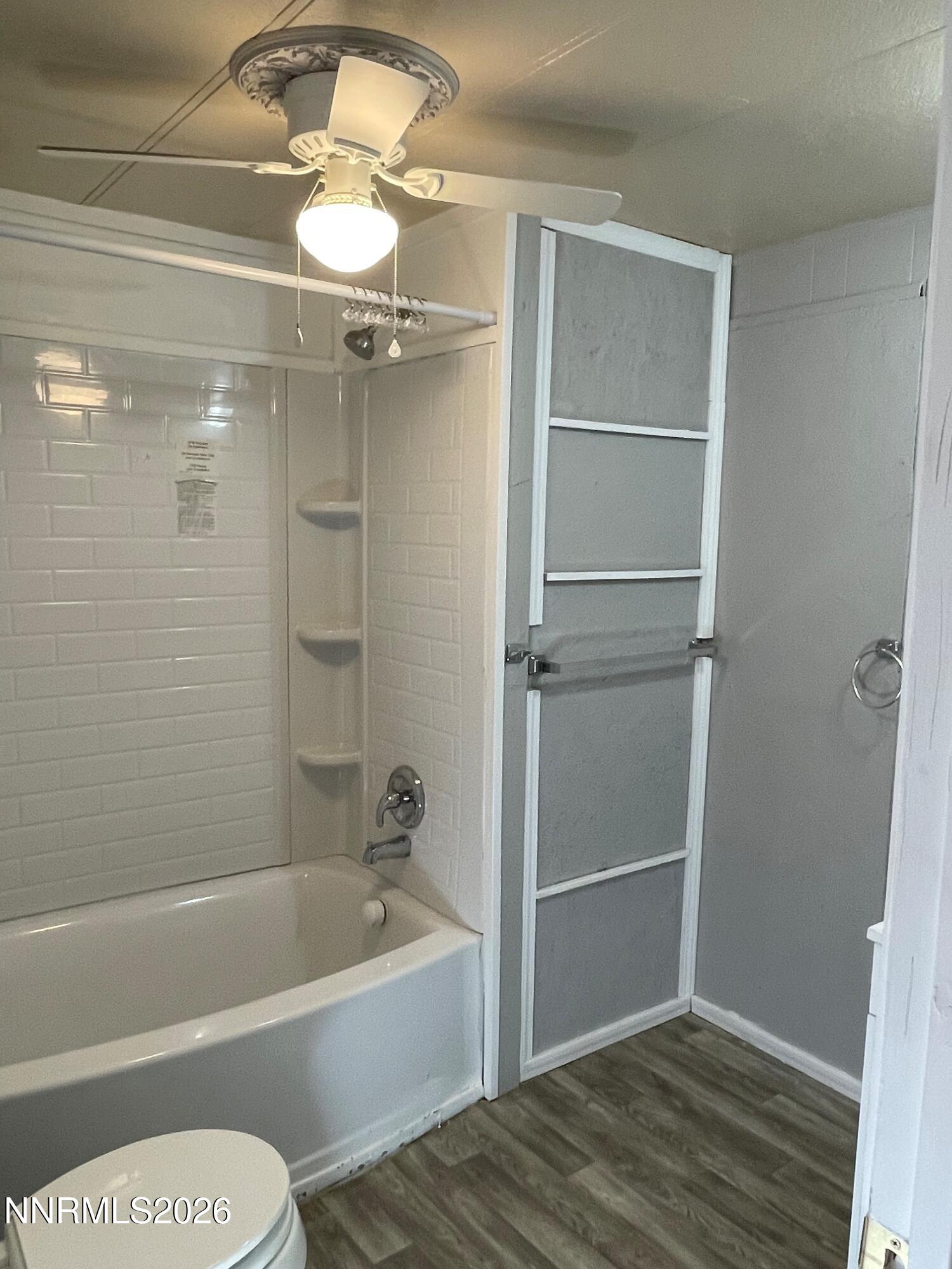 400 Mira Street Reno, NV 89521 - Photo 5 of 11 a bathroom with a shower a bathtub and a shower
