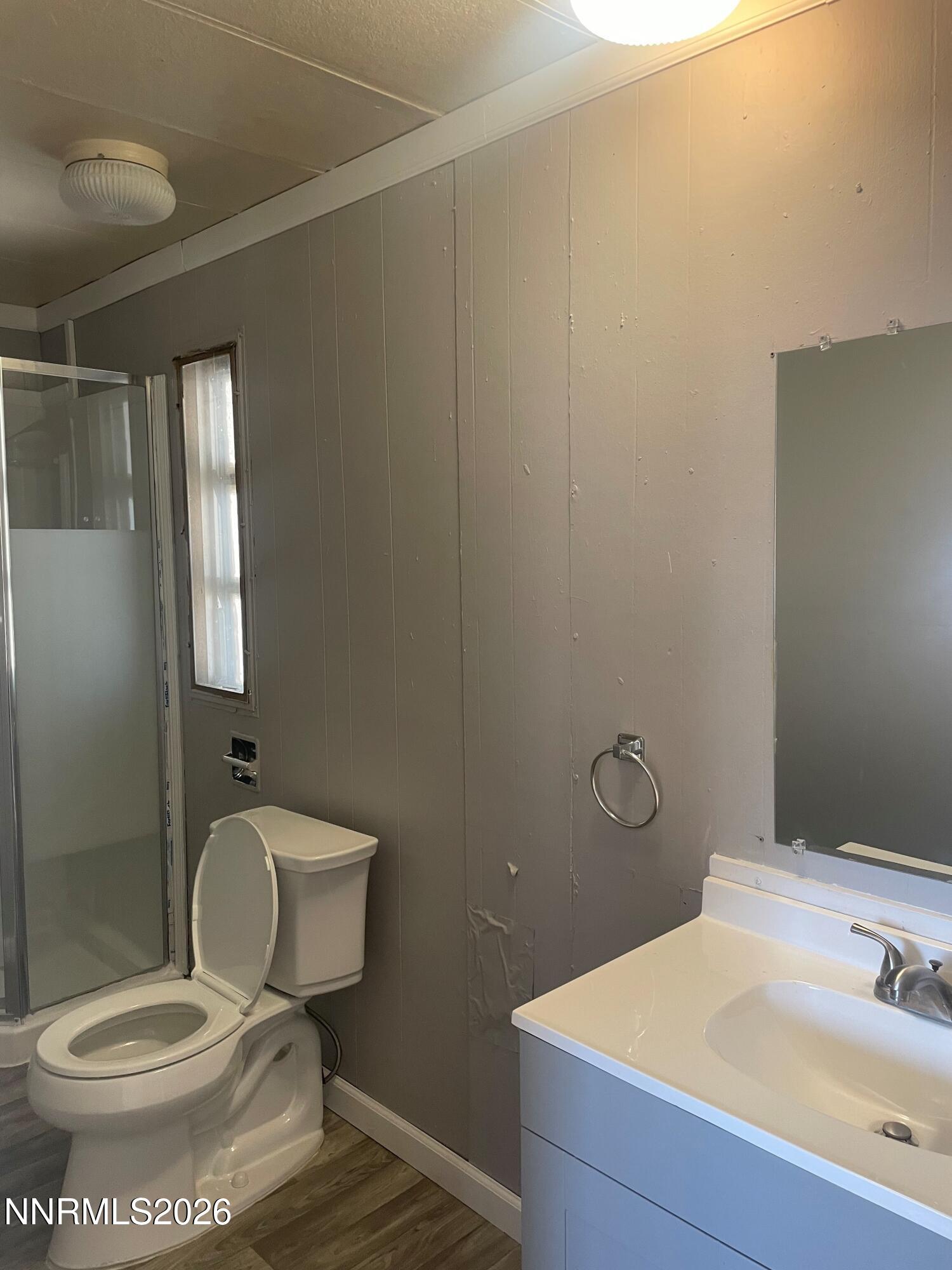 400 Mira Street Reno, NV 89521 - Photo 10 of 11 a bathroom with a toilet and a sink