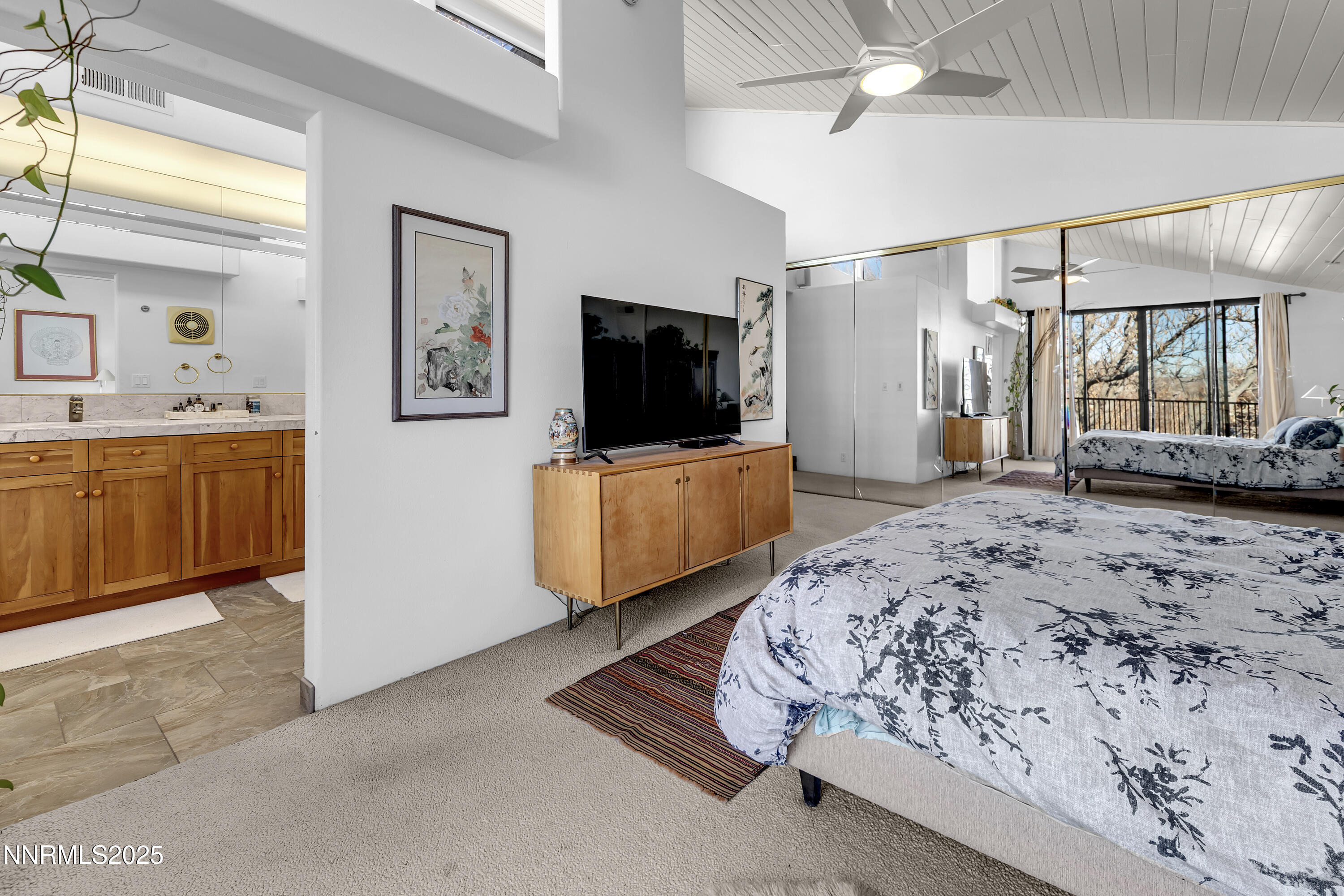512 Island Avenue Reno, NV 89501 - Photo 24 of 30 a living room with furniture and a flat screen tv