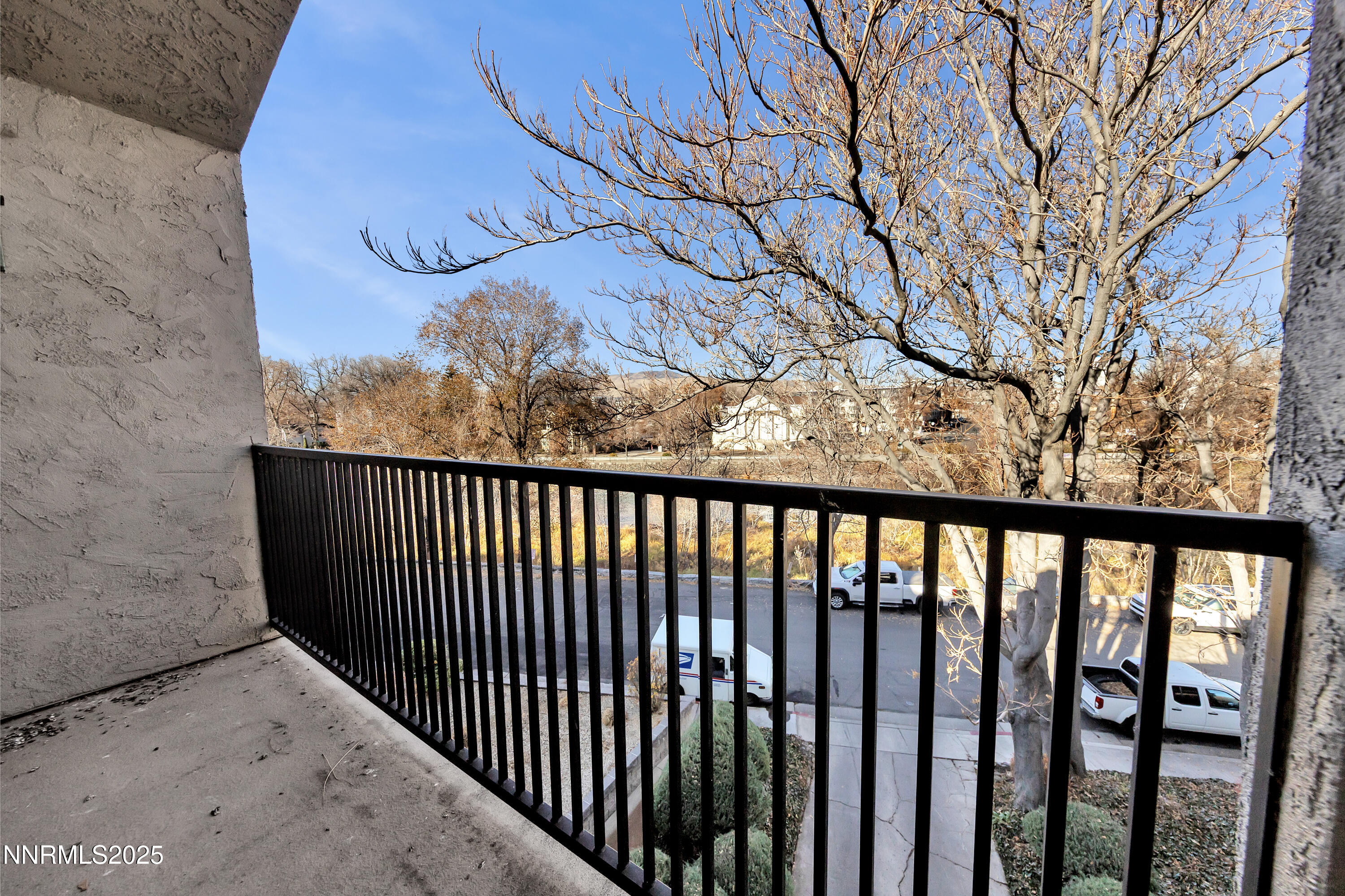 512 Island Avenue Reno, NV 89501 - Photo 25 of 30 a view of a balcony with wooden fence