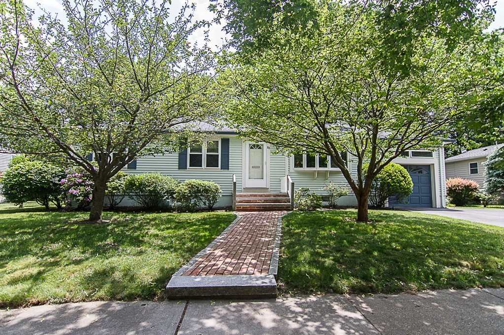 88 Selwyn Road Newton, MA 02461 - Photo 1 of 26 a view of backyard with table and chairs and a large tree