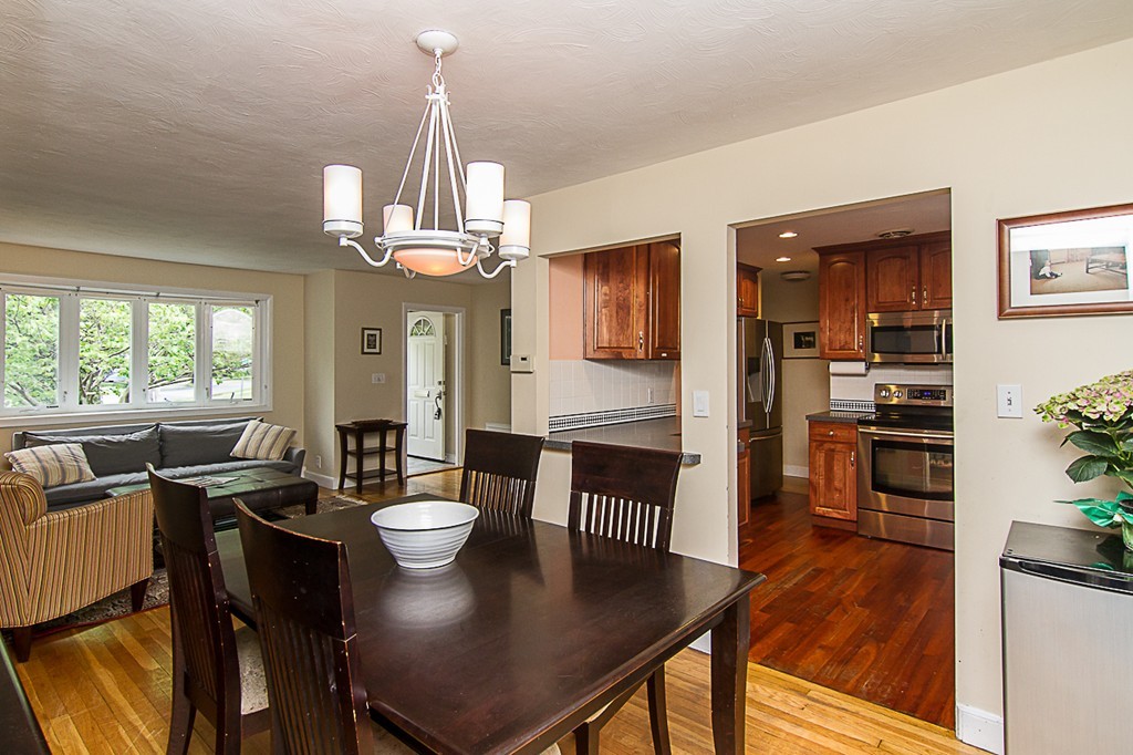 88 Selwyn Road Newton, MA 02461 - Photo 13 of 26 a view of a dining room with furniture window and wooden floor