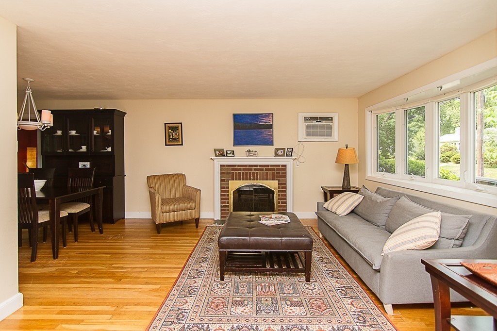 88 Selwyn Road Newton, MA 02461 - Photo 18 of 26 a living room with furniture and a fireplace