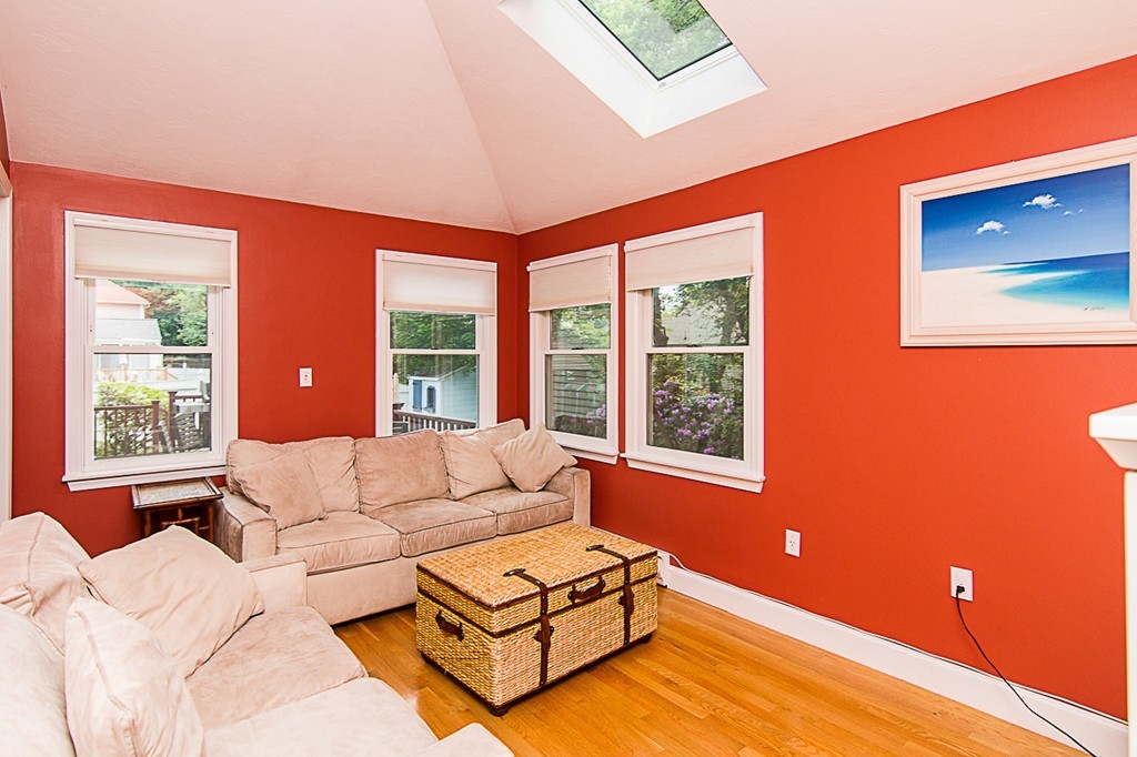 88 Selwyn Road Newton, MA 02461 - Photo 3 of 26 a living room with furniture and a large window