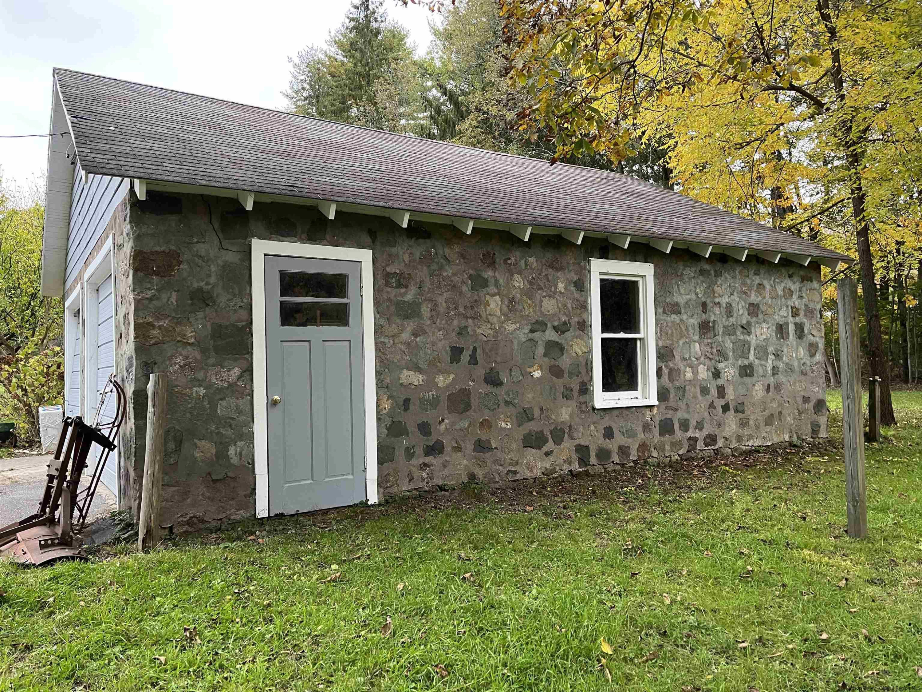 145 Sportsman Road Napanoch, NY 12458 - Photo 26 of 31 a front view of a house with a garden