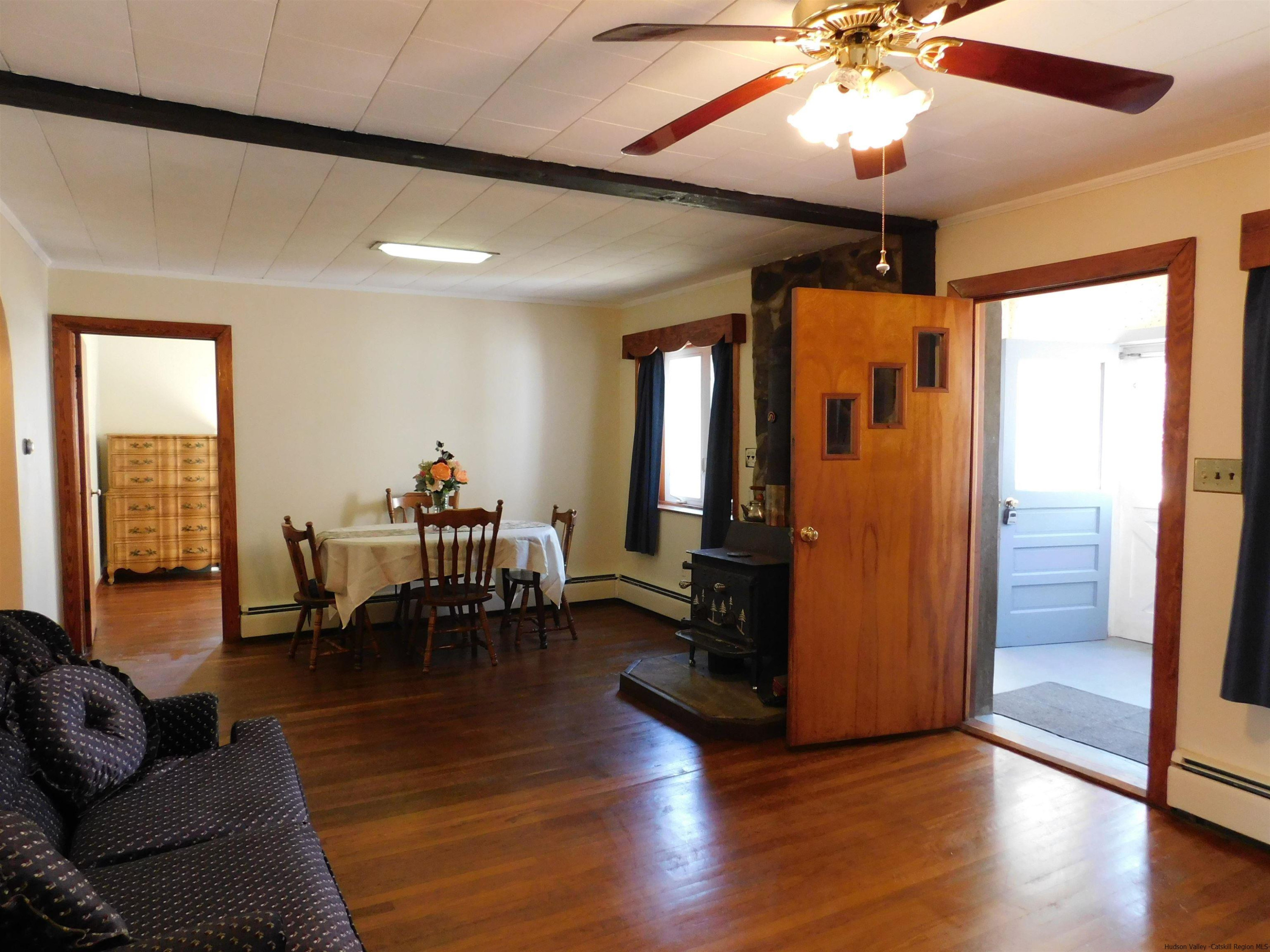 145 Sportsman Road Napanoch, NY 12458 - Photo 3 of 31 a living room with furniture and wooden floor