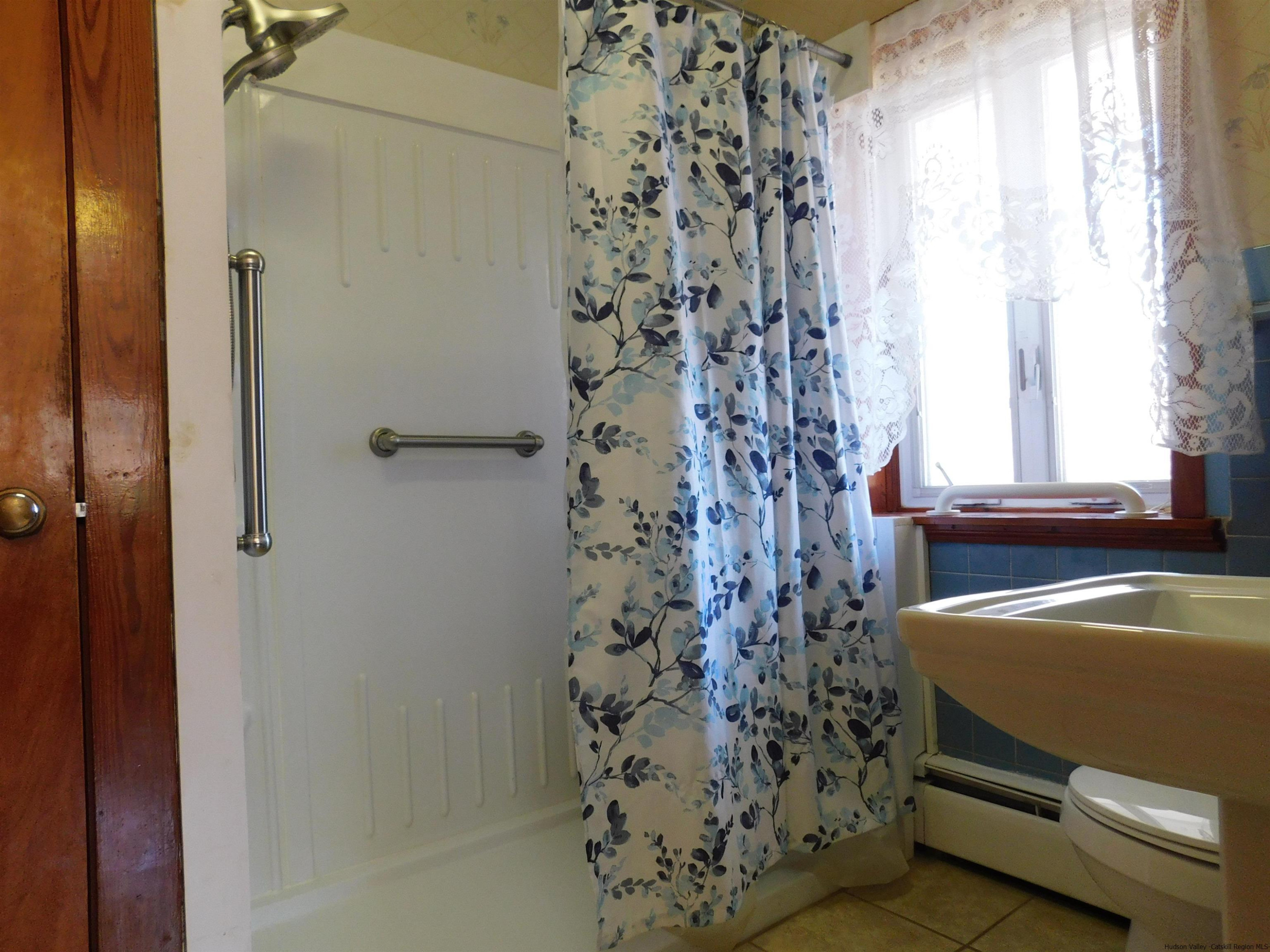 145 Sportsman Road Napanoch, NY 12458 - Photo 10 of 31 a view of bathroom with shower and window