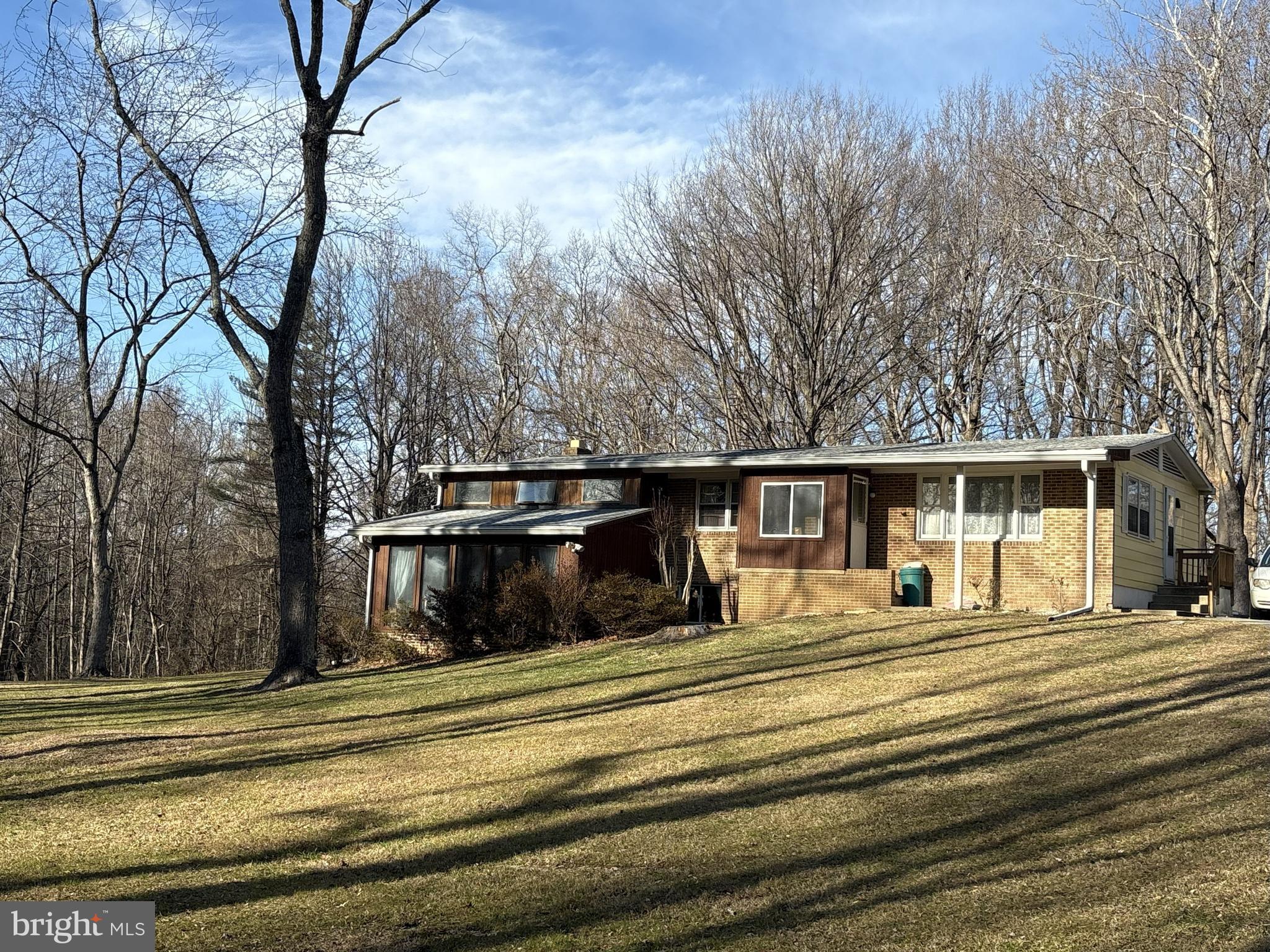 1662 Paris Oaks Road Owings, MD 20736 - Photo 2 of 2 a view of a house with a large trees