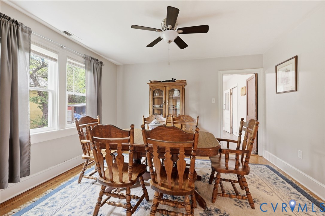 3510 East River Road Petersburg, VA 23803 - Photo 11 of 21 a view of a dining room with furniture window and wooden floor