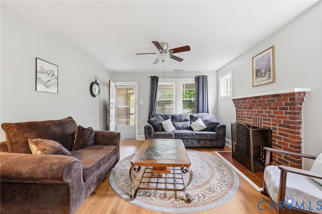 3510 East River Road Petersburg, VA 23803 - Photo 12 of 21 a living room with furniture and a fireplace