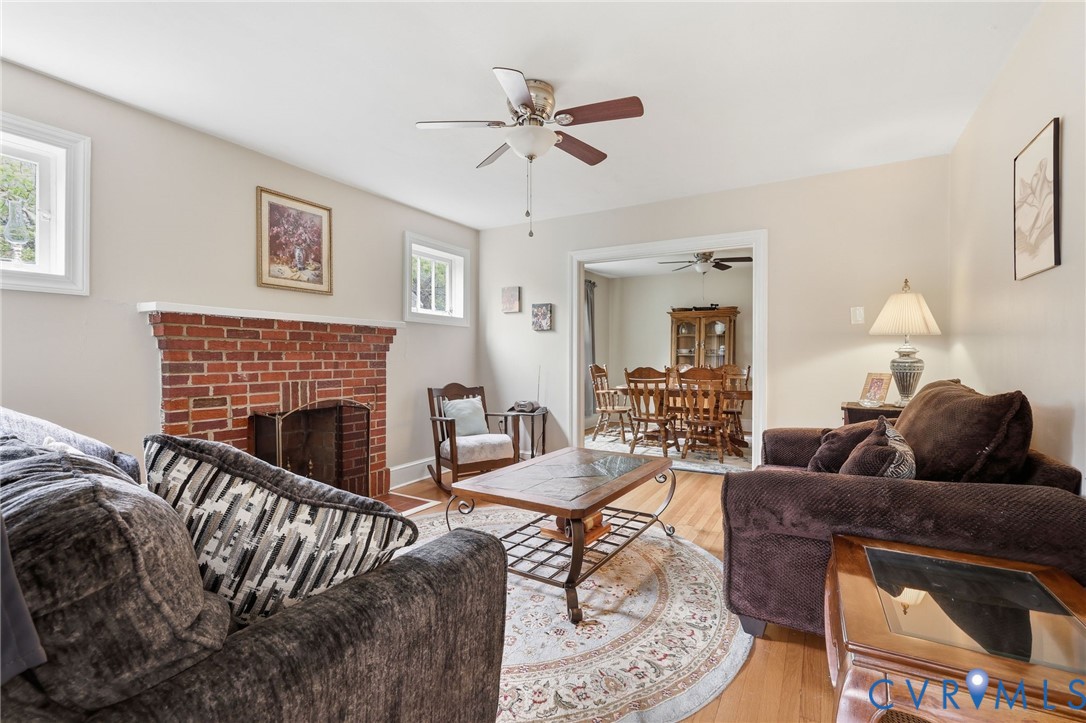 3510 East River Road Petersburg, VA 23803 - Photo 14 of 21 a living room with furniture and a fireplace