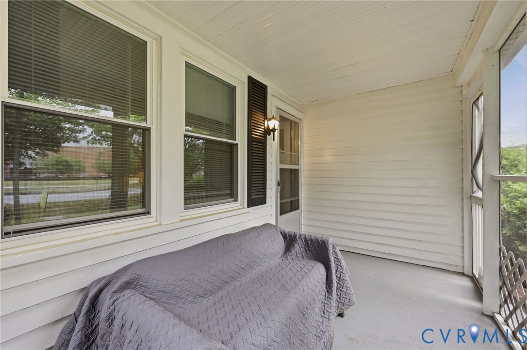 3510 East River Road Petersburg, VA 23803 - Photo 16 of 21 a bedroom with a bed and a large window