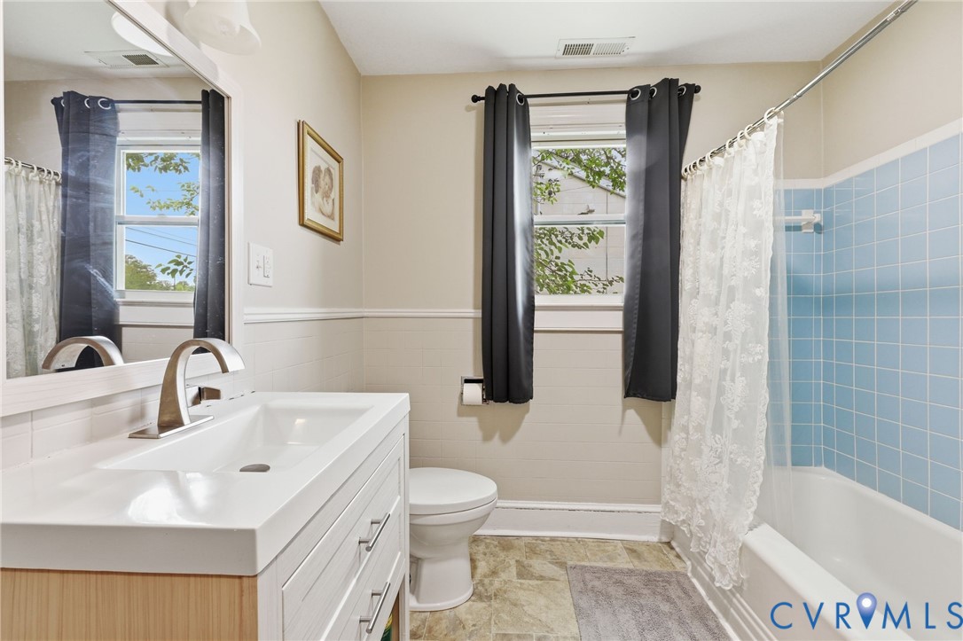 3510 East River Road Petersburg, VA 23803 - Photo 19 of 21 a bathroom with a sink toilet and shower