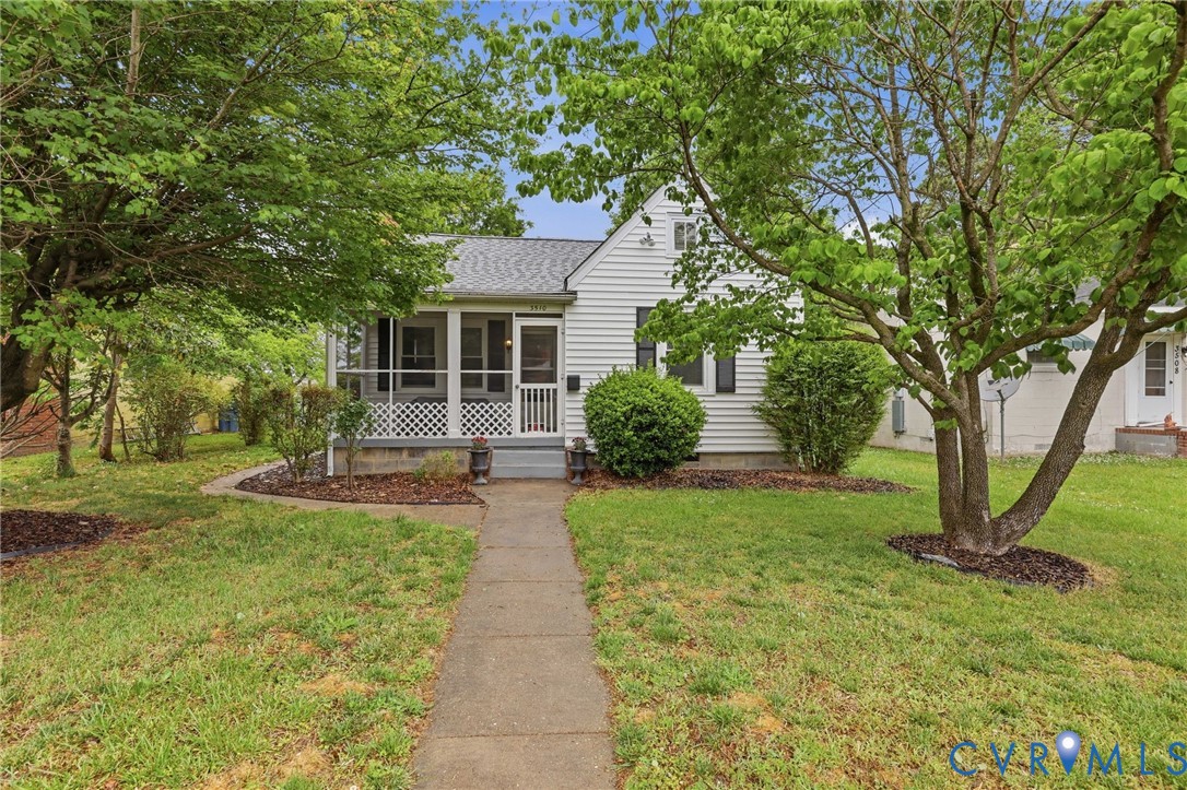 3510 East River Road Petersburg, VA 23803 - Photo 3 of 21 a front view of a house with garden