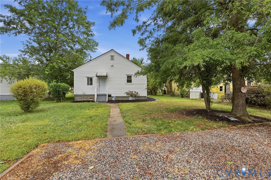 3510 East River Road Petersburg, VA 23803 - Photo 5 of 21 a view of a house with a yard