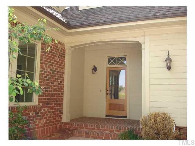 5326 Landguard Drive Raleigh, NC 27613 - Photo 2 of 17 Covered "friends entry" at side porchwith large stained door and beveled glass Other