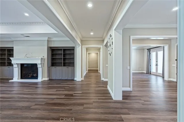 a kitchen with stainless steel appliances granite countertop a stove and a refrigerator