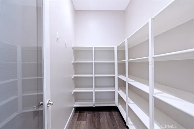 a view of a kitchen from the hallway
