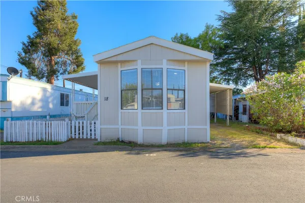 a front view of a house with a garage