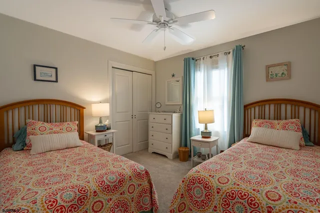a bathroom with a sink a mirror and a toilet