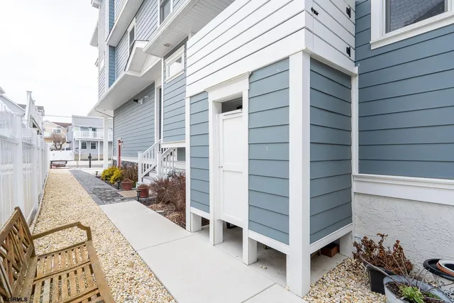 a view of a balcony with wooden floor