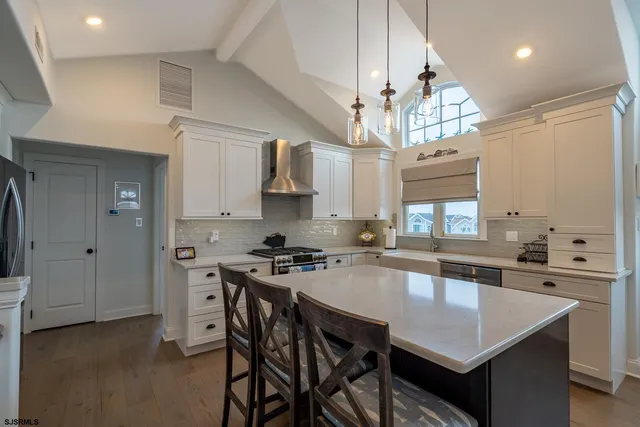 a bathroom with a shower and mirror
