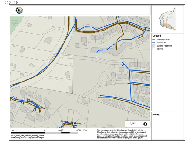 a picture of a bedroom with a white bed