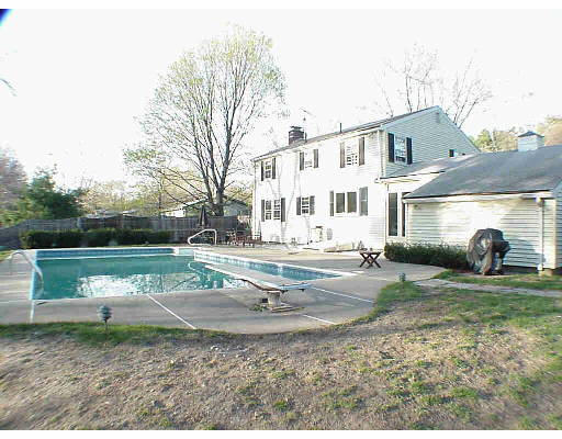 4 Peterson Road Natick, MA 01760 - Photo 2 of 3 a view of a house with a yard
