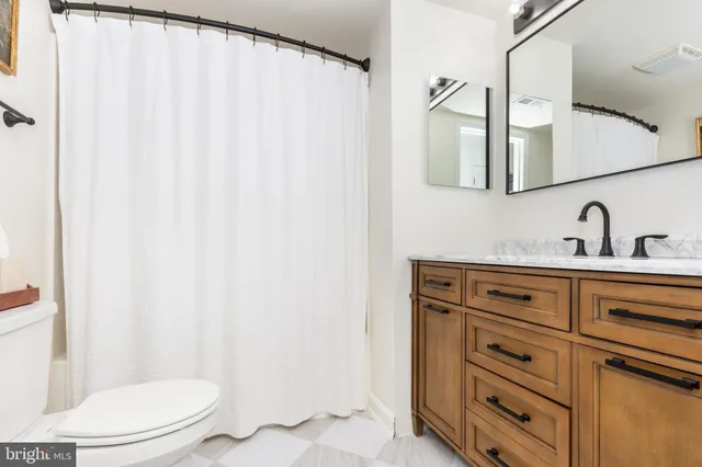 a living room with furniture and window