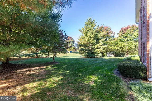 a view of an ocean house and a yard