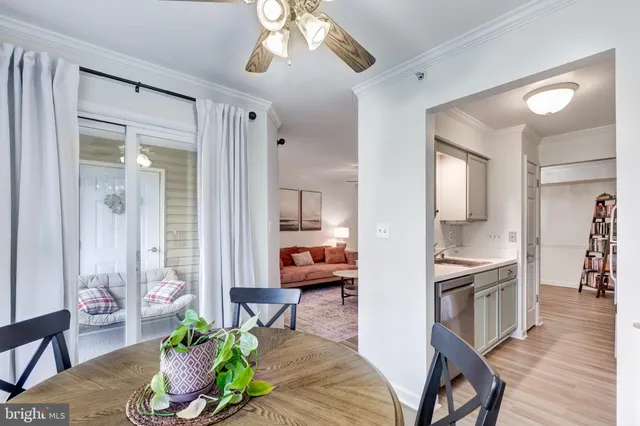 a view of a kitchen and dining room
