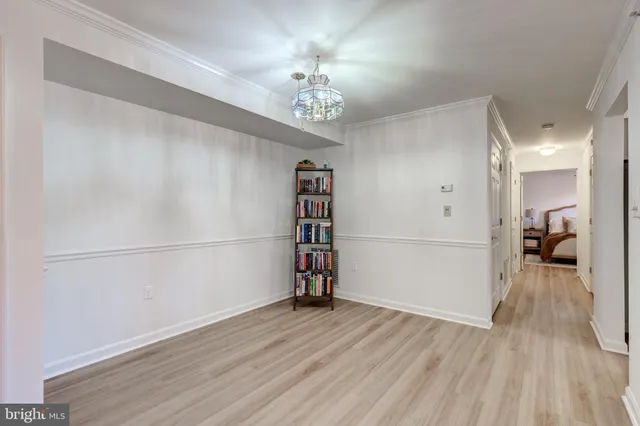 a view of livingroom with hardwood floor and a ceiling fan