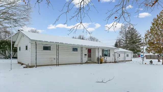 a view of a house with a garage