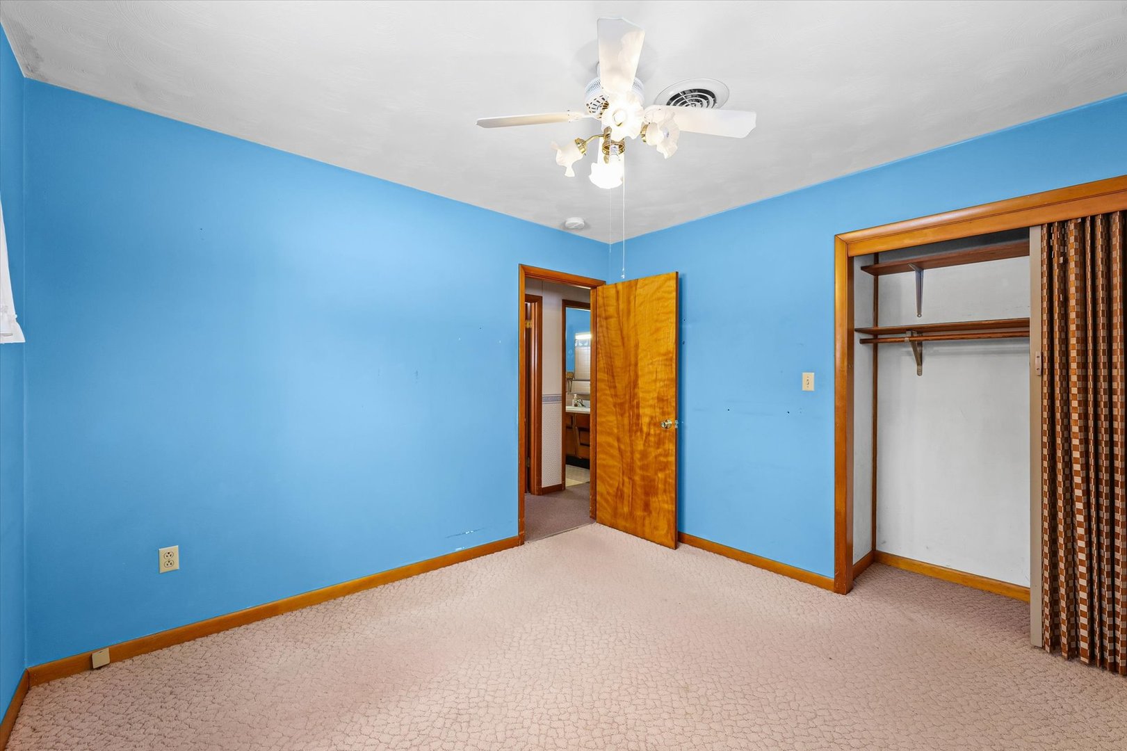 107 North Ellen Street Homer, IL 61849 - Photo 18 of 27 a view of an empty room with a chandelier fan