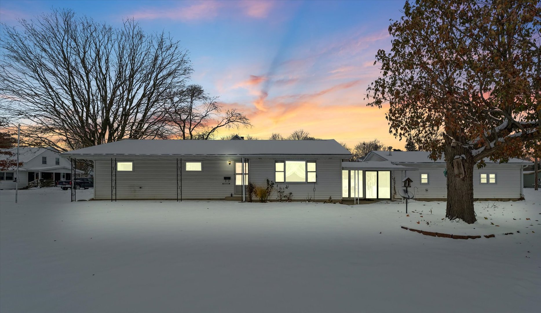 107 North Ellen Street Homer, IL 61849 - Photo 2 of 27 a view of a house with a yard and large tree