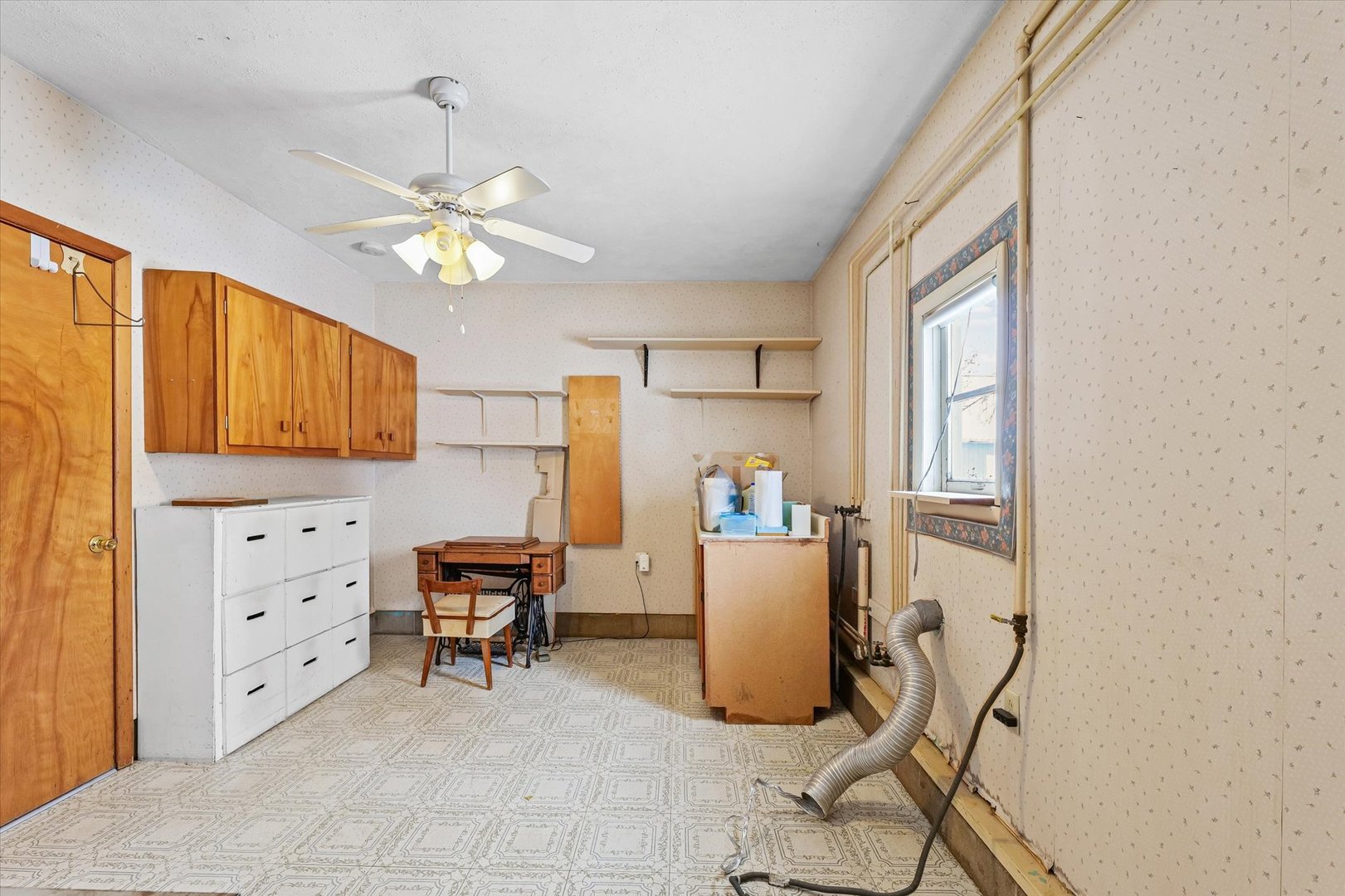 107 North Ellen Street Homer, IL 61849 - Photo 24 of 27 a view of a workspace with furniture and a window