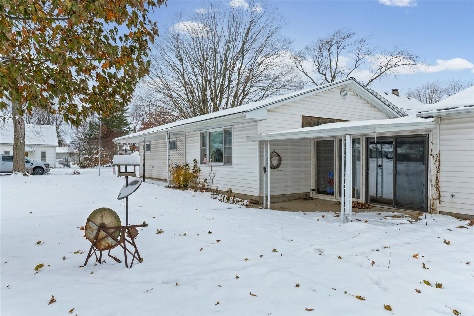 107 North Ellen Street Homer, IL 61849 - Photo 26 of 27 a backyard of a house with table and chairs