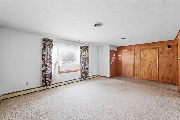 an empty room with closet