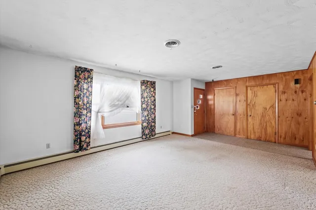 an empty room with closet