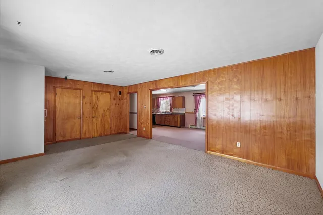 a view of a livingroom with an entryway