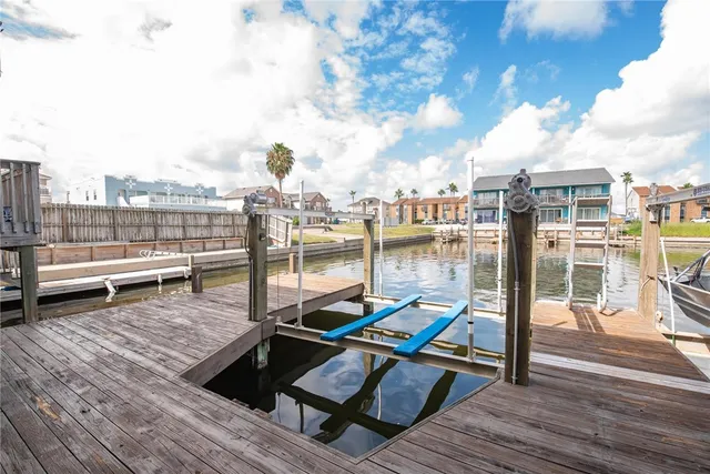 a view of a terrace with wooden benches