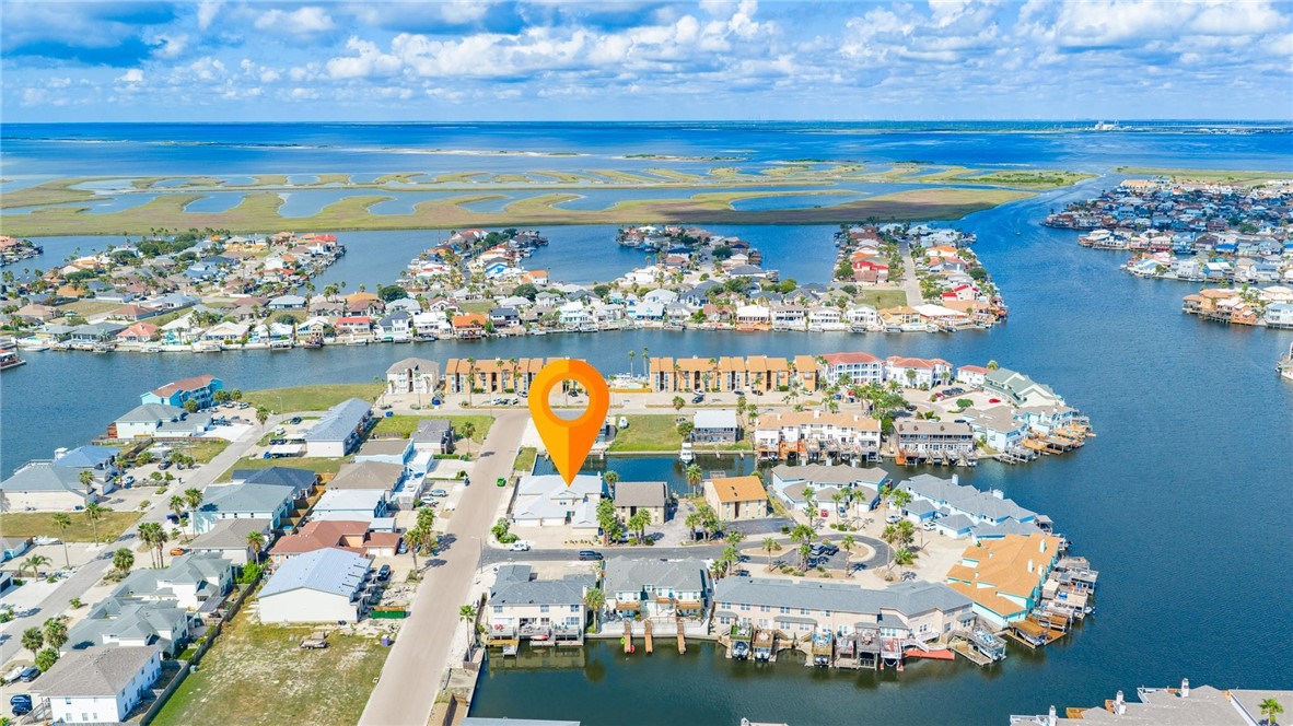 15417 Gun Cay Court, Unit B Corpus Christi, TX 78418 - Photo 5 of 35 a view of a balcony with an ocean