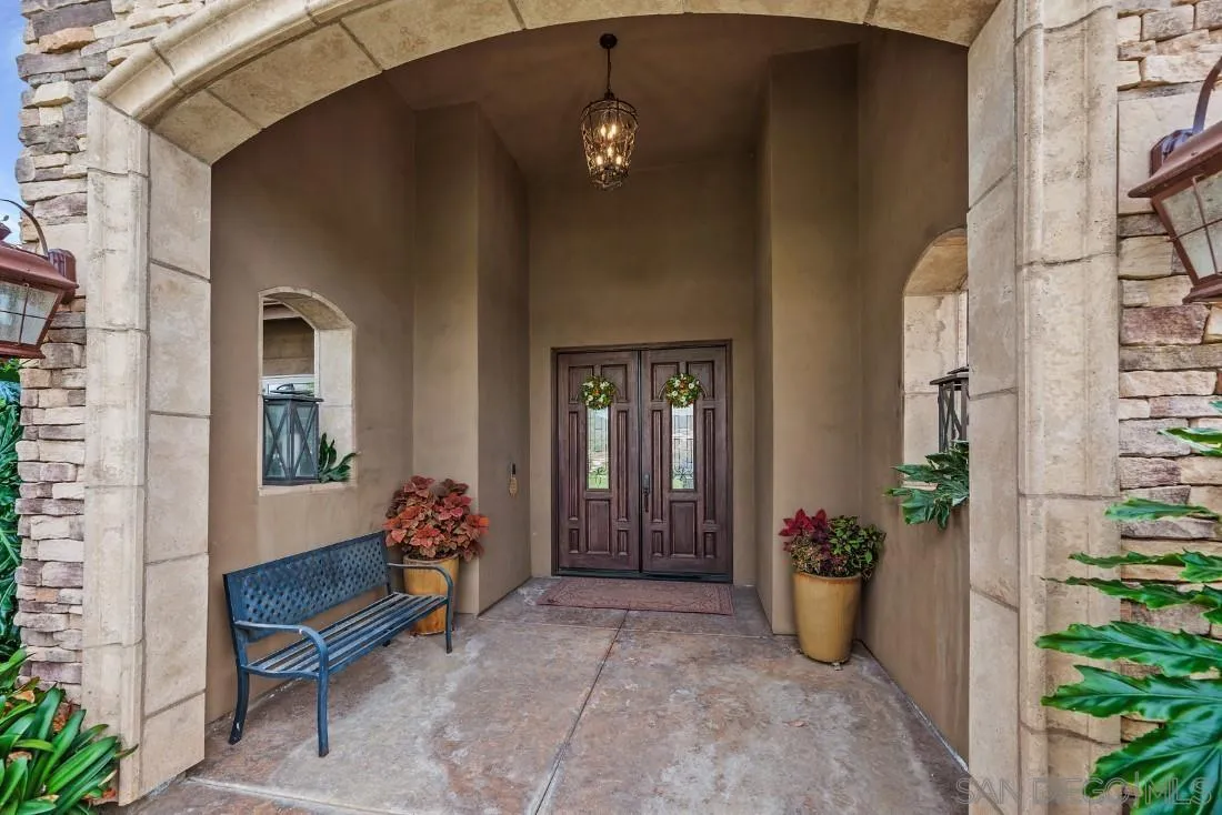 1070 Heritage Ranch Road Ramona, CA 92065 - Photo 16 of 73 a front view of a house with outdoor seating