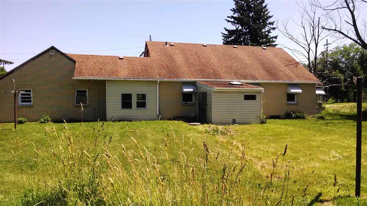 3219 Prairie Road Rockford, IL 61102 - Photo 12 of 12 a house view with a garden space
