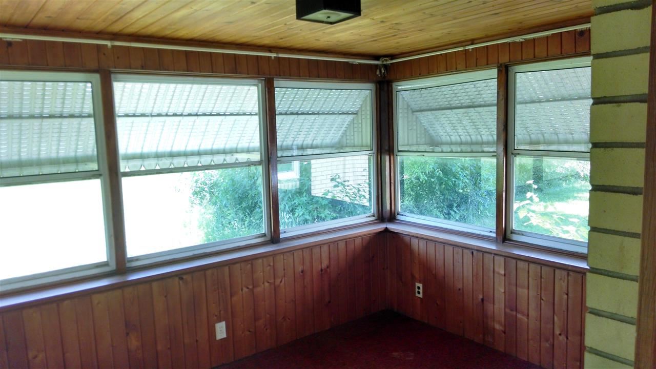 3219 Prairie Road Rockford, IL 61102 - Photo 7 of 12 a view of an empty room with a window