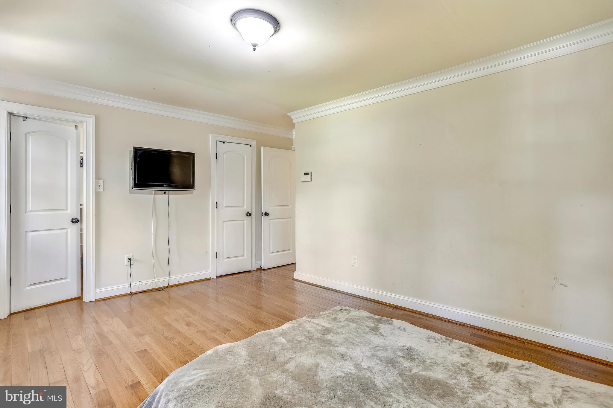 10145 Colebrook Avenue Potomac, MD 20854 - Photo 11 of 30 wooden floor in an empty room