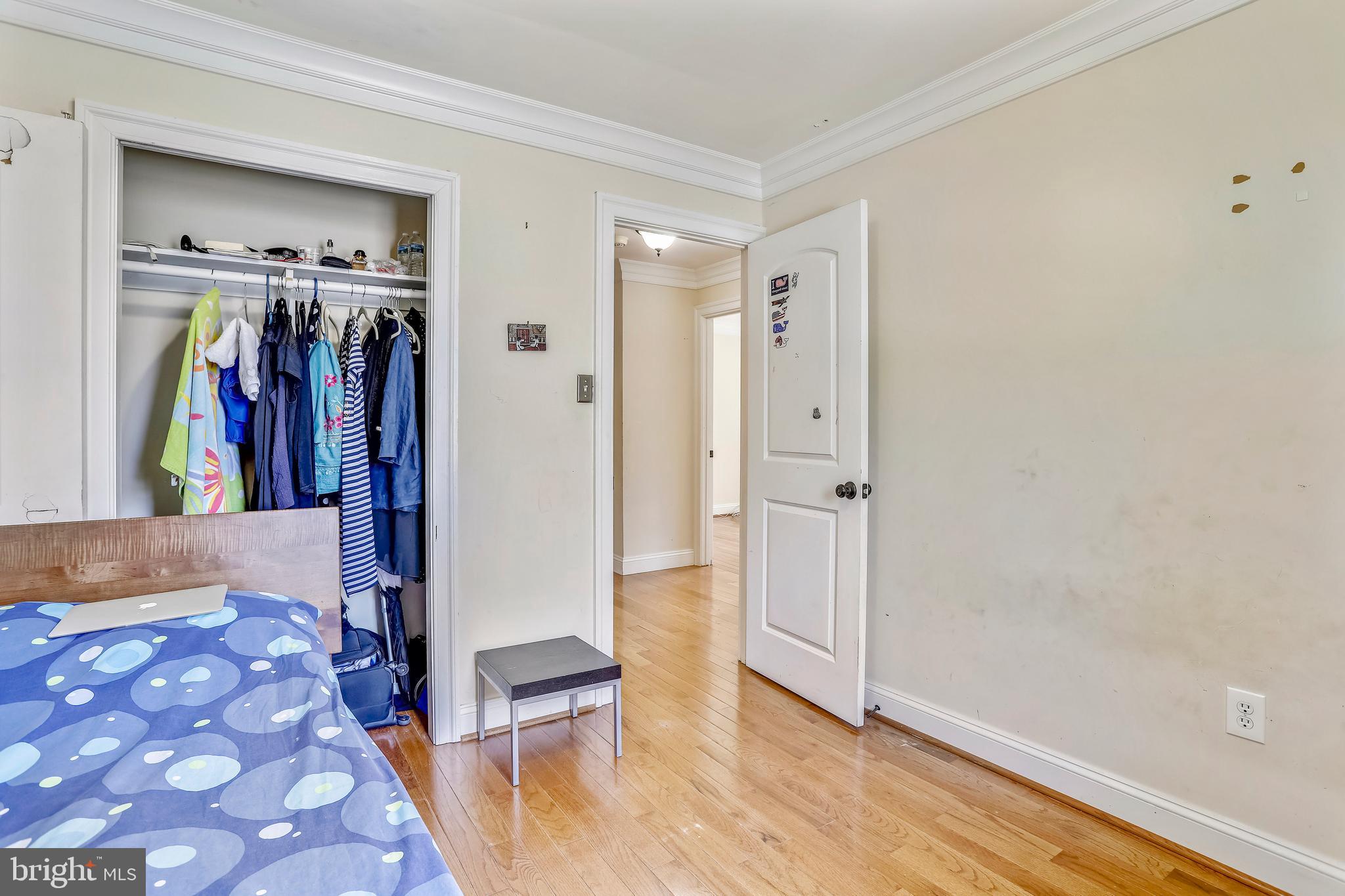 10145 Colebrook Avenue Potomac, MD 20854 - Photo 22 of 30 a view of walk in closet with clothes and shoes